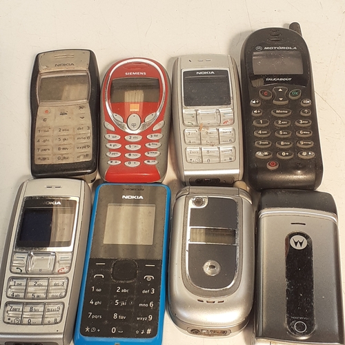 28 - Selection of 8 old style mobile phones.  Mostly Nokia with one or two other models.