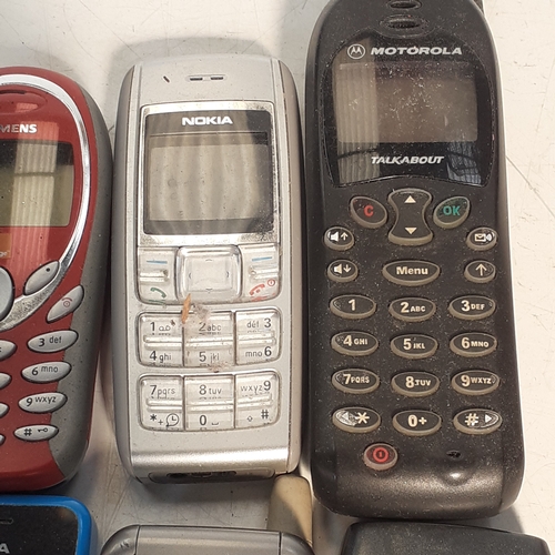 28 - Selection of 8 old style mobile phones.  Mostly Nokia with one or two other models.