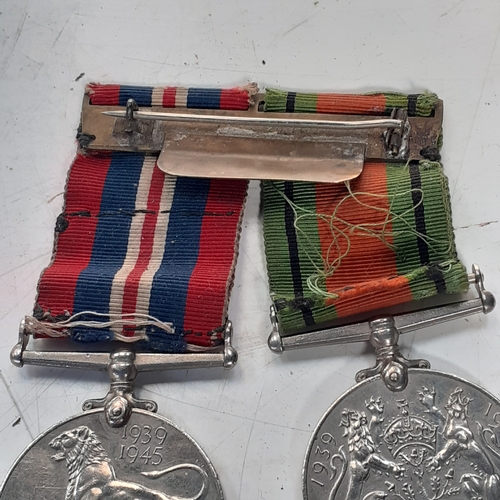 32 - 2 medals. The Defence medal and the 1939 to 1945 war medal. On ribbons. Medals require a polish and ... 