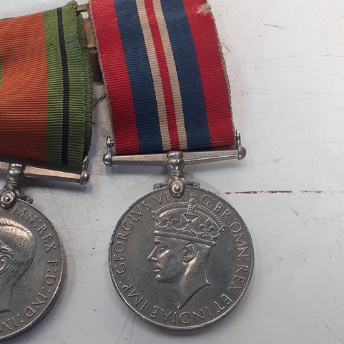 32 - 2 medals. The Defence medal and the 1939 to 1945 war medal. On ribbons. Medals require a polish and ... 