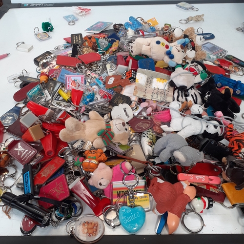 35 - A massive joblot of collectable keyring. Vintage and modern.  Literally hundreds