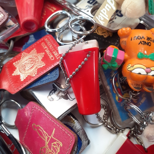 35 - A massive joblot of collectable keyring. Vintage and modern.  Literally hundreds