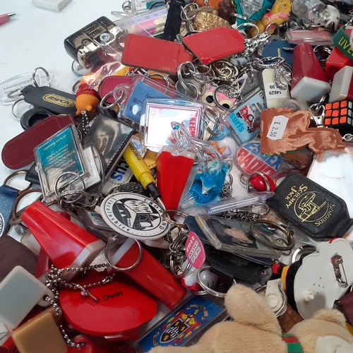 35 - A massive joblot of collectable keyring. Vintage and modern.  Literally hundreds