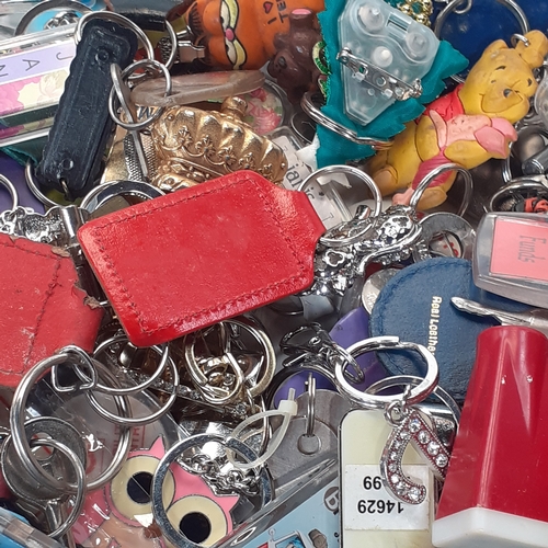 35 - A massive joblot of collectable keyring. Vintage and modern.  Literally hundreds