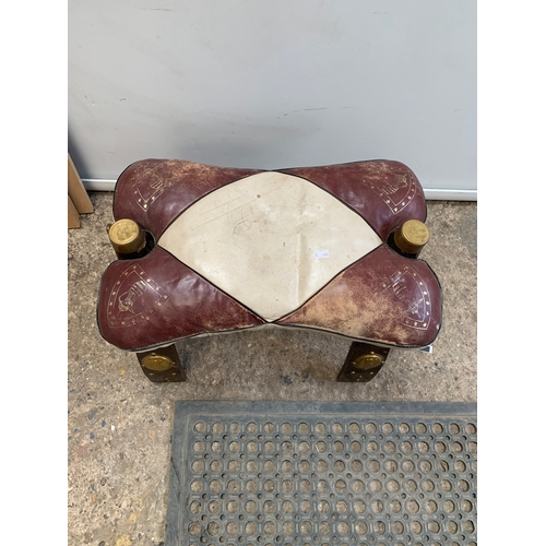 182 - Leather saddle style stool with brass detailing