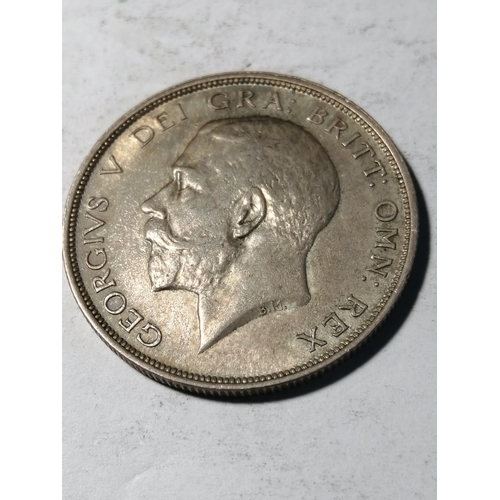 34A - 1914 George V halfcrown in about extremely fine condition