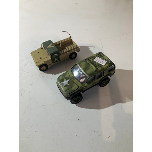 113 - 2 die cast vehicles one is a Hummer and the other is a lone star army vehicle