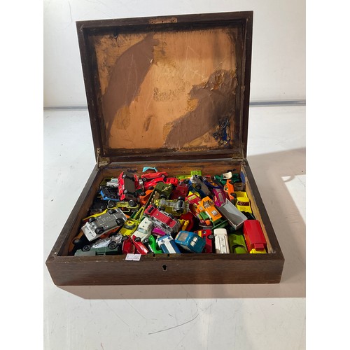 121 - Wooden box with a selection of diecast vehicles by Corgi, Matchbox, Lesney etc