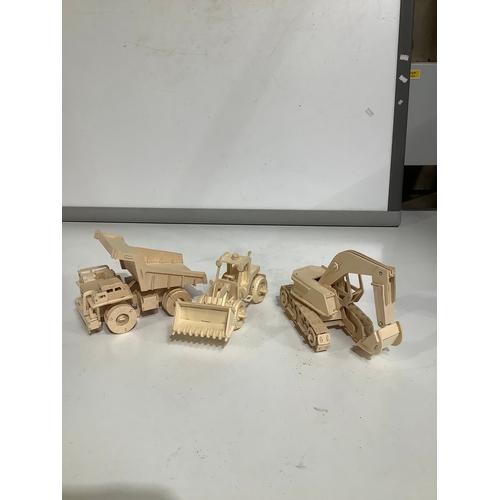 295 - Wooden models includes dumper truck digger tractor plus Caterpillar digger