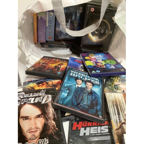 316 - Bag full of DVDs includes Paul Walker into the blue box set of the Lee Evans Matt Damian green zone ... 