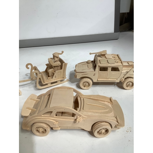 378 - Wooden models of car Army Vehicle Santa Claus and reindeers