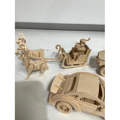 378 - Wooden models of car Army Vehicle Santa Claus and reindeers