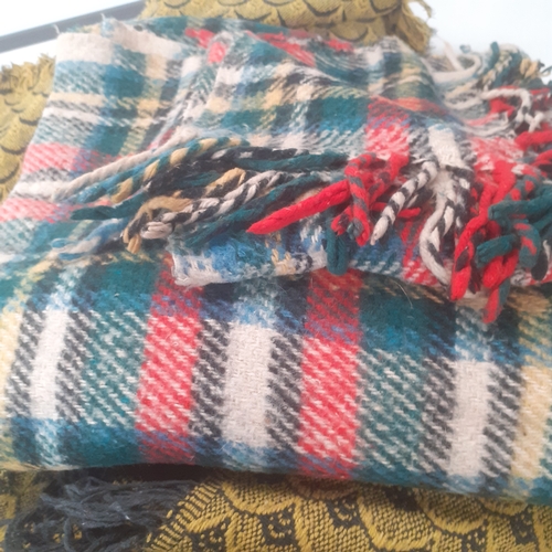 45 - One chequered picnic blanket and two tassell edge throws which look double bed size, possibly bigger... 