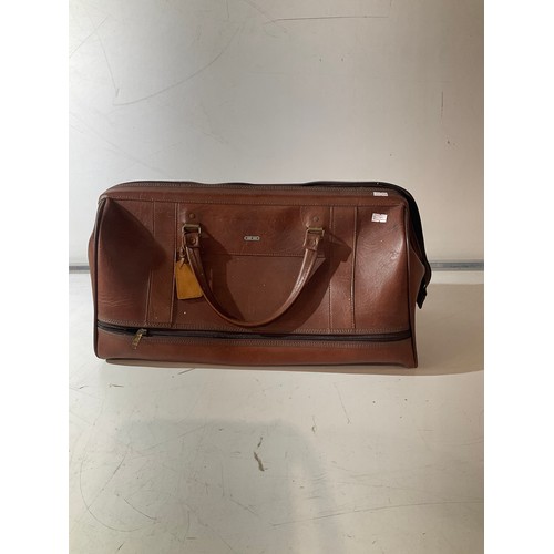 464 - Brown luggage bag