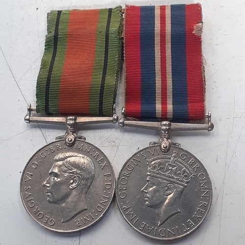 32 - 2 medals. The Defence medal and the 1939 to 1945 war medal. On ribbons. Medals require a polish and ... 