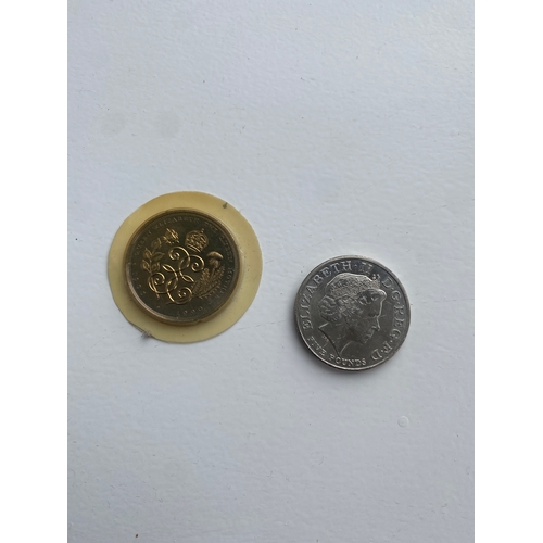 46 - 2x £5 coins - 1990 & 2005 - one in packaging