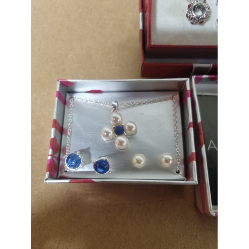 99A - Sets of new matching necklace earrings sets in boxes