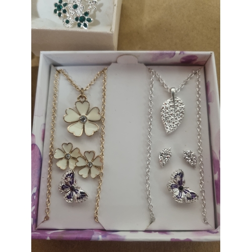 99A - Sets of new matching necklace earrings sets in boxes