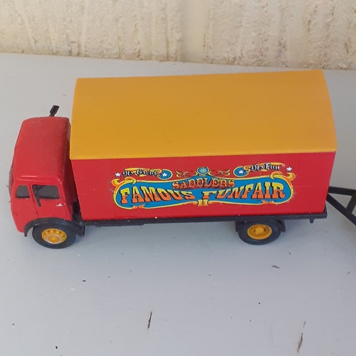 1 - Saddlers Famous Funfair diecast truck and trailer by Corgi caravan.