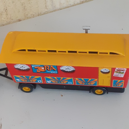 1 - Saddlers Famous Funfair diecast truck and trailer by Corgi caravan.