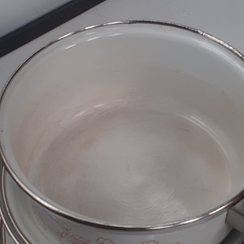 2 - 3 Vitrex enamel pans. Graduating sizes. Good quality and sound solid condition. Interiors could do w... 