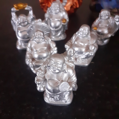 5 - Buddha ornaments x 12. Various sizes and detail. A little dusty but no damage