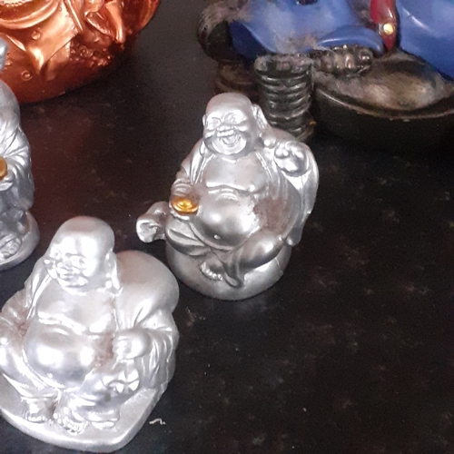 5 - Buddha ornaments x 12. Various sizes and detail. A little dusty but no damage