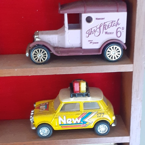 6 - Display shelving with a selection of diecast and two other random cars, noddy and a Toyland Co op mi... 