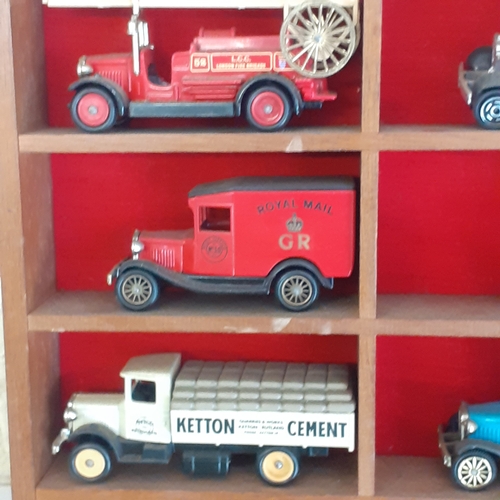 6 - Display shelving with a selection of diecast and two other random cars, noddy and a Toyland Co op mi... 