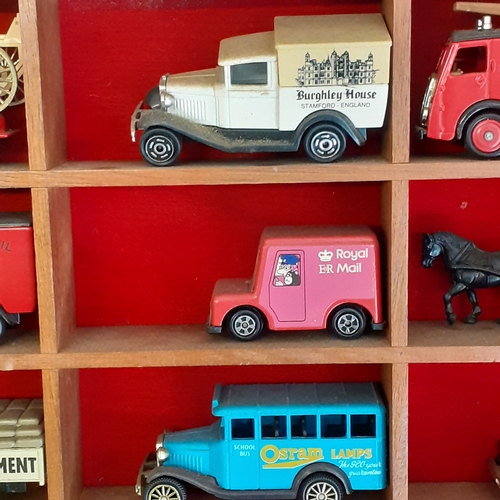 6 - Display shelving with a selection of diecast and two other random cars, noddy and a Toyland Co op mi... 