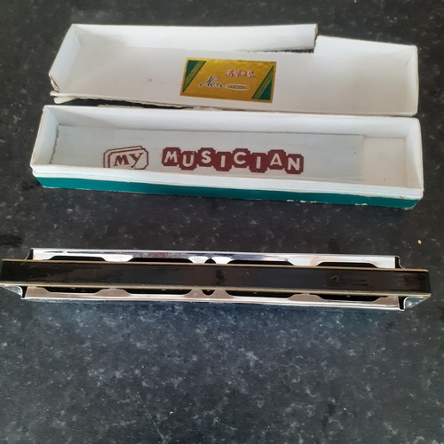 7 - Hero harmonica in original box. Harmonica is good but box a bit worn