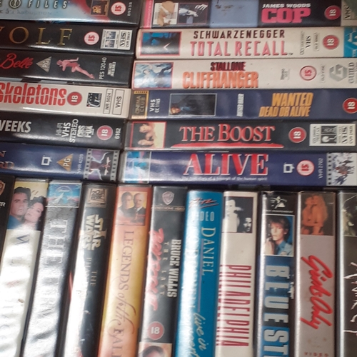 12 - A large quantity of VHS cassettes. Includes several box sets and an erotic girls only movie. Some du... 