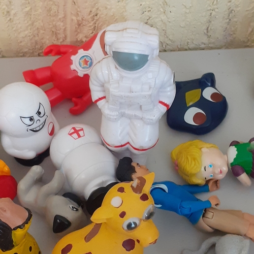 19 - Large quantity of small toys. Includes Smurf, Batman, spacemen, small animals, some wind up toys and... 