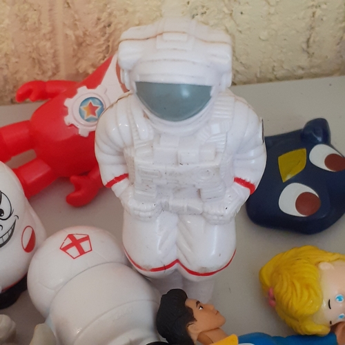 19 - Large quantity of small toys. Includes Smurf, Batman, spacemen, small animals, some wind up toys and... 