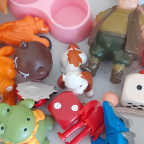 19 - Large quantity of small toys. Includes Smurf, Batman, spacemen, small animals, some wind up toys and... 