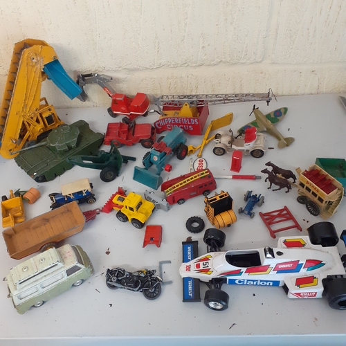 27 - Selection of diecast vehicles including a Dinky Supertoy elevator loader, a Chipperfield circus trai... 