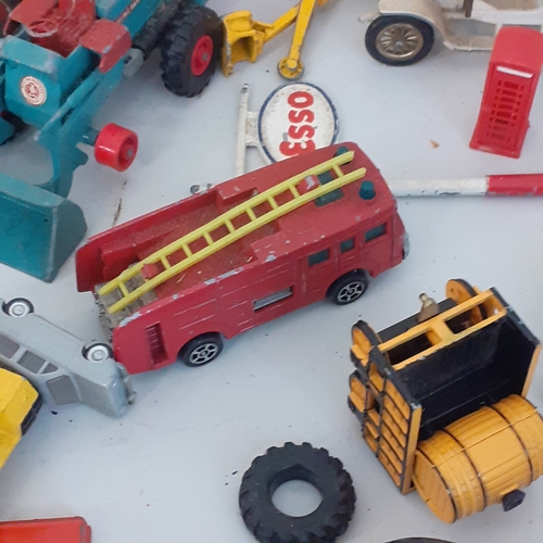 27 - Selection of diecast vehicles including a Dinky Supertoy elevator loader, a Chipperfield circus trai... 