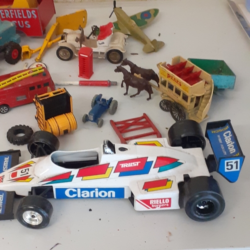 27 - Selection of diecast vehicles including a Dinky Supertoy elevator loader, a Chipperfield circus trai... 