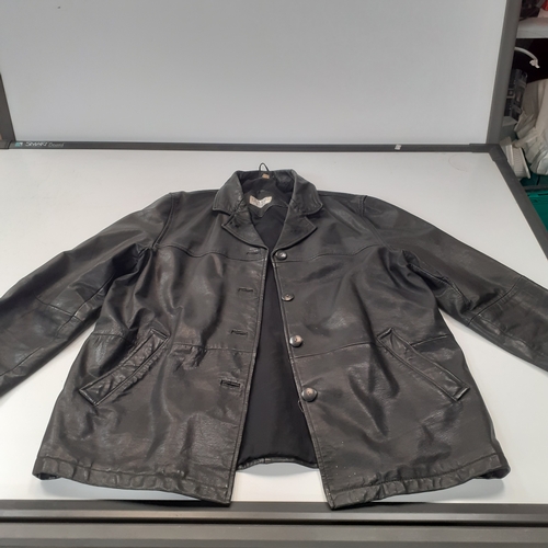 33 - Womans classic leather jacket. No size found. Looks med-large. Good condition, may have had a pin ba... 