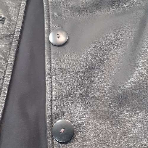 33 - Womans classic leather jacket. No size found. Looks med-large. Good condition, may have had a pin ba... 