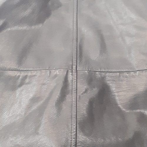 33 - Womans classic leather jacket. No size found. Looks med-large. Good condition, may have had a pin ba... 