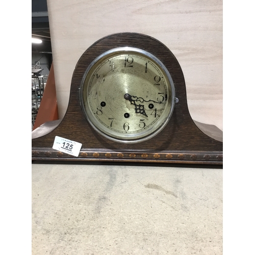 125 - Domed, wooden mantle clock. No glass, no key.