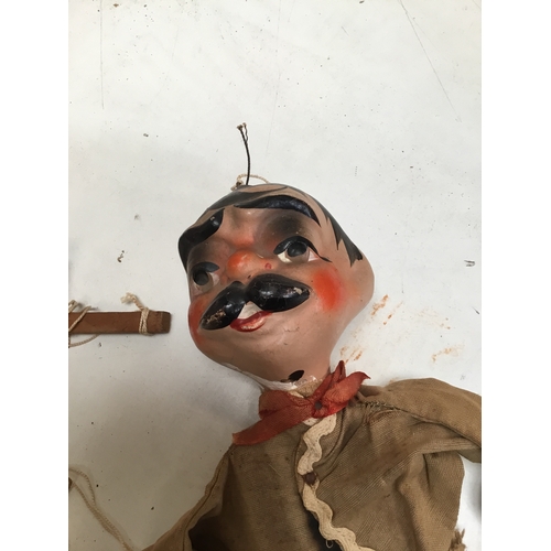 171 - Vintage puppet on a string. Painted pottery face, with wooden framed fabric covered body. Age relate... 