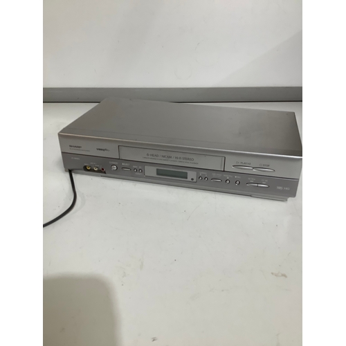 311 - Sharp video plus VHS recorder. Model VC – MH815.