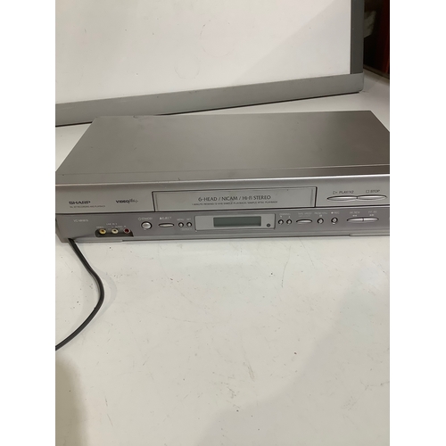 311 - Sharp video plus VHS recorder. Model VC – MH815.