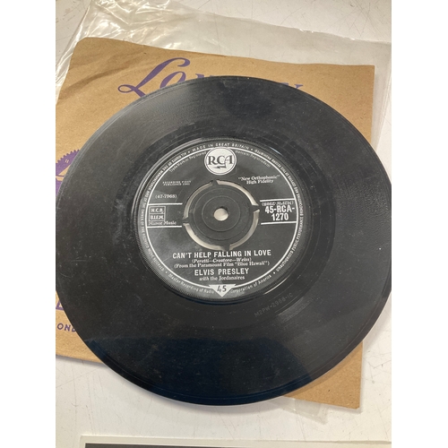 142A - Elvis Presley 45rpm rca London record can’t help falling in love and b side rock a hula baby include... 