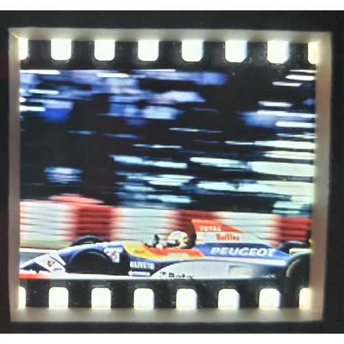 103A - Original film cells from Rubens Barrichello driving the Jordan Estoril F1 Testing. Framed and glazed... 