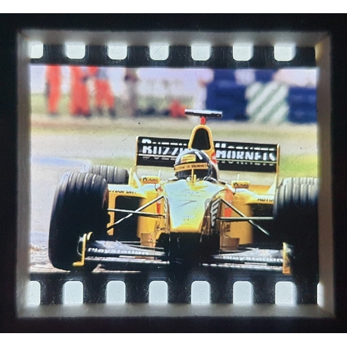 119A - Original film cells from Jordan’s Damon Hill racing in the F1 Japanese Grand Prix 1999. Framed and g... 