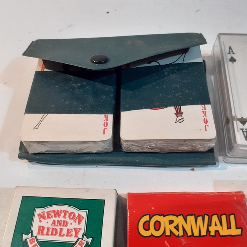 11 - Multiple decks of playing cards.  Some new, still wrapped and some vintage. Include, Guinness,  Coro... 