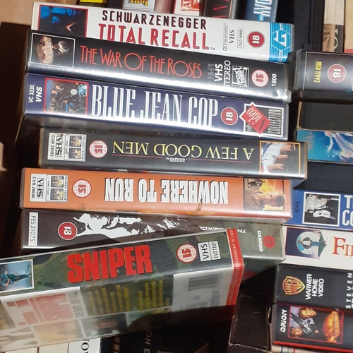 20 - A number of VCR cassettes including popular vintage films and some blank tapes